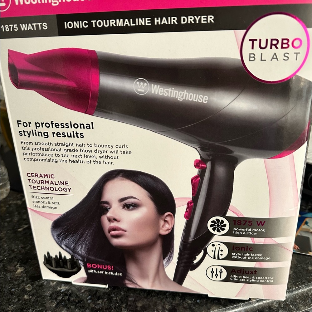 Westinghouse 1875 watt ionic tourmaline hair dryer. Never opened, still sealed.